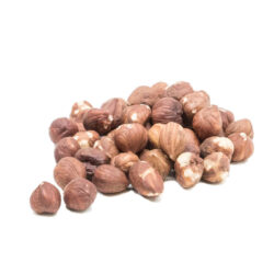 A pile of whole hazelnuts with a smooth, shiny surface, featuring hues of brown and pink, isolated on a white background.