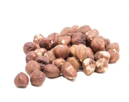 A pile of whole hazelnuts with a smooth, shiny surface, featuring hues of brown and pink, isolated on a white background.