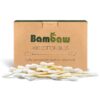 Bambaw organic cotton bamboo cotton swabs laying in a pile in front of an unbleached cardboard packaging