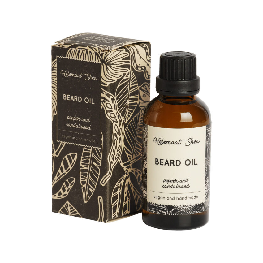 Sandalwood and Pepper beard oil bottle next to brown and tan box