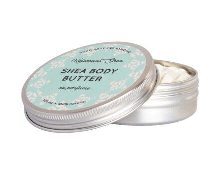 whipped shea butter in a metal tin