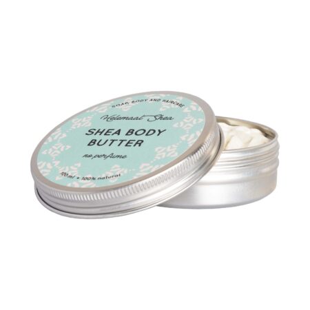 whipped shea butter in a metal tin