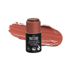A multi-use cosmetic stick beside its swatch, displaying a creamy, muted reddish-brown shade with hints of soft pink