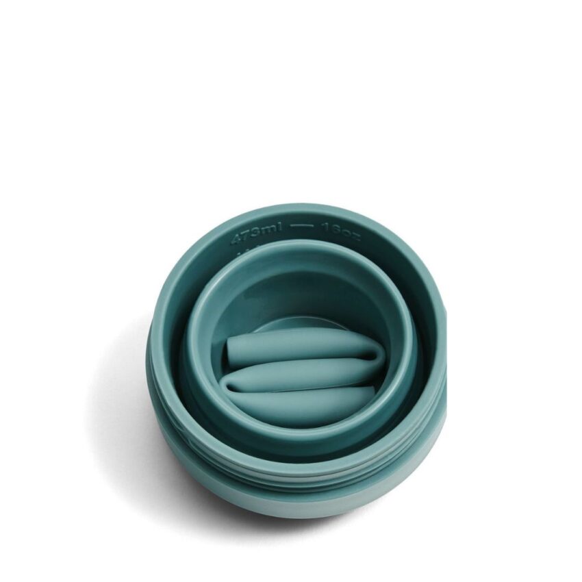 Inside look of collapsed Stojo reusable to go cup 470mL in color Eucalyptus (green)