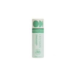 A single Odyskin plastic-free tinted sunstick SPF 50, shown against a white background. The sunstick has a pastel green label with white and dark green text. The label indicates it is medium tinted, 100% natural, and provides SPF 50 protection. The packaging is eco-friendly and compostable, emphasizing its sustainable design.